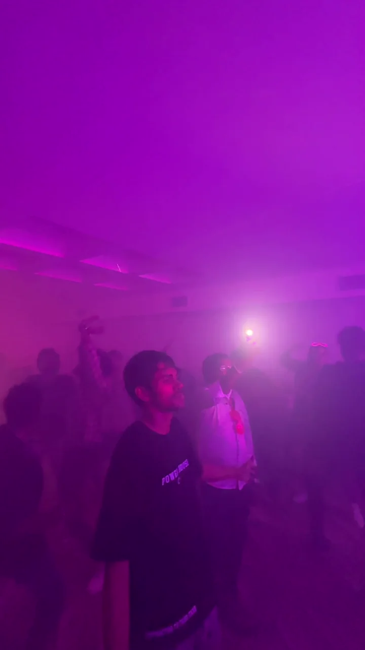 A lively dance floor in blue, red and purple event lighting